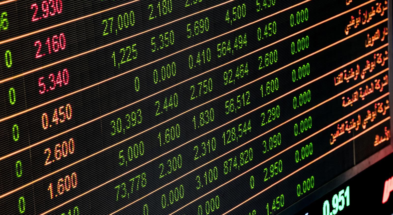 Stock-market ticker board with numbers (abstract, no faces/brand)